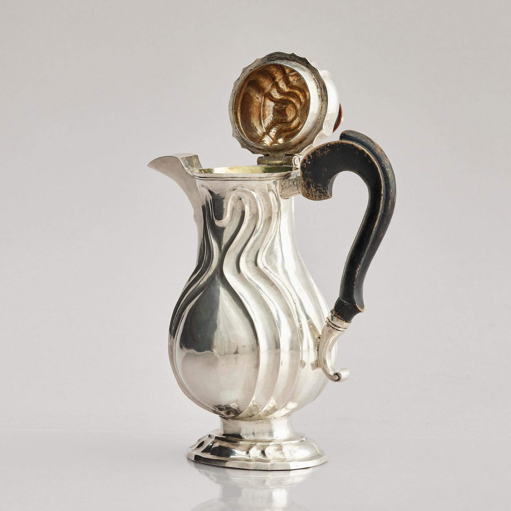 A German 18th century silver coffee-pot, mark of Johan Jacob Loose, Halle (Saale), Sachsen-Anhalt.