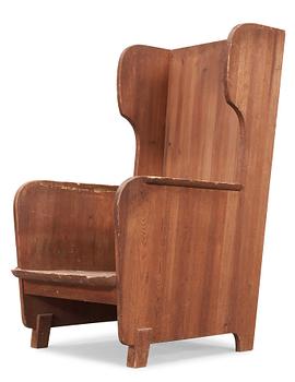 An Axel Einar Hjorth 'Lovö' stained pine armchair, Nordiska Kompaniet, Sweden 1930's.