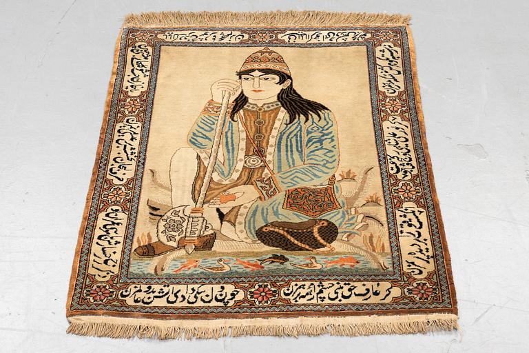 A rug, semi-antique Kashan figural, ca 105 x 79,5 cm.