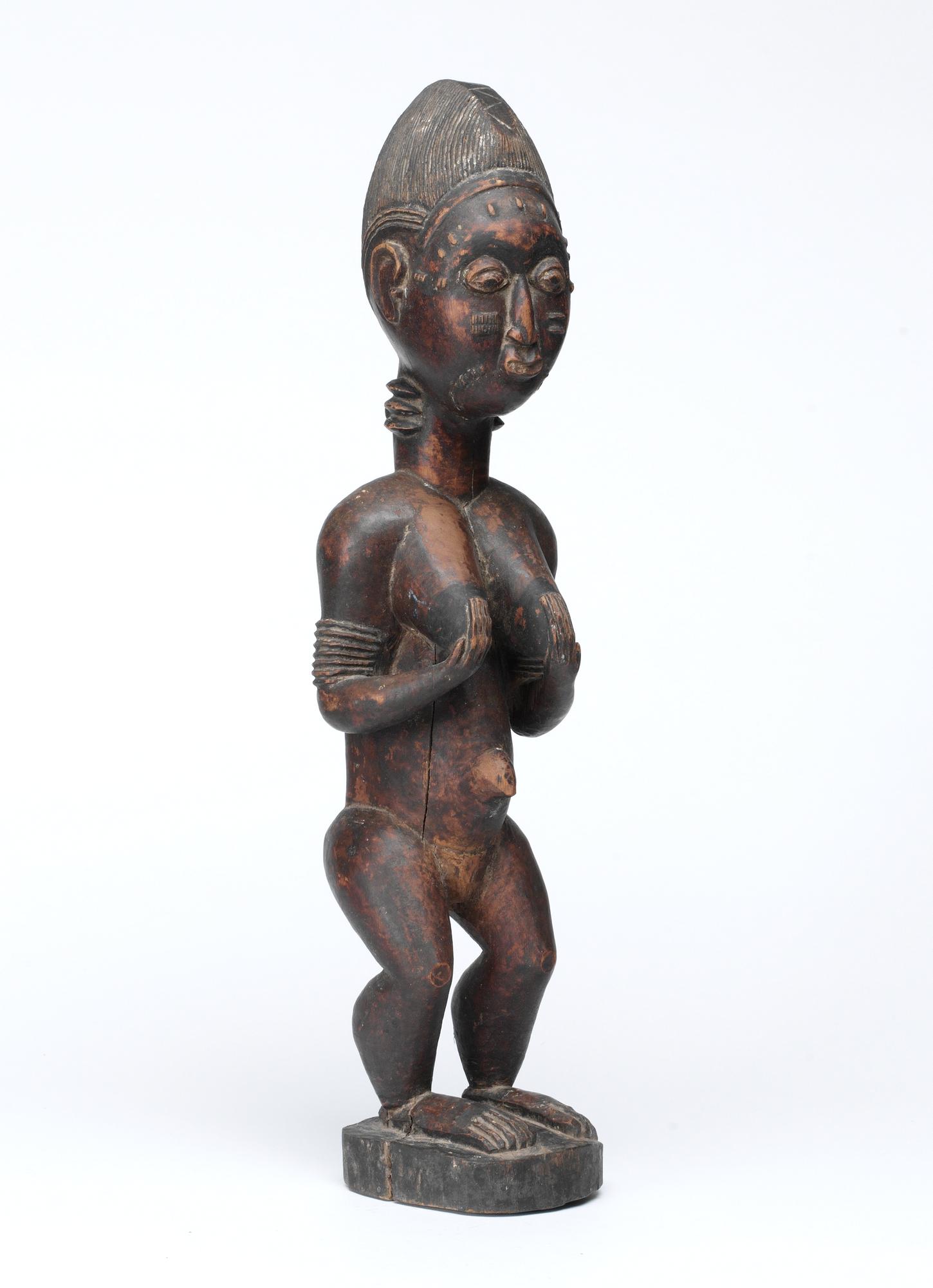 FETISCH. Trä. Baoule-stammen. Côte d'Ivoire (Elfenbenskusten) omkring 1940-1950. Höjd 47,5 cm.