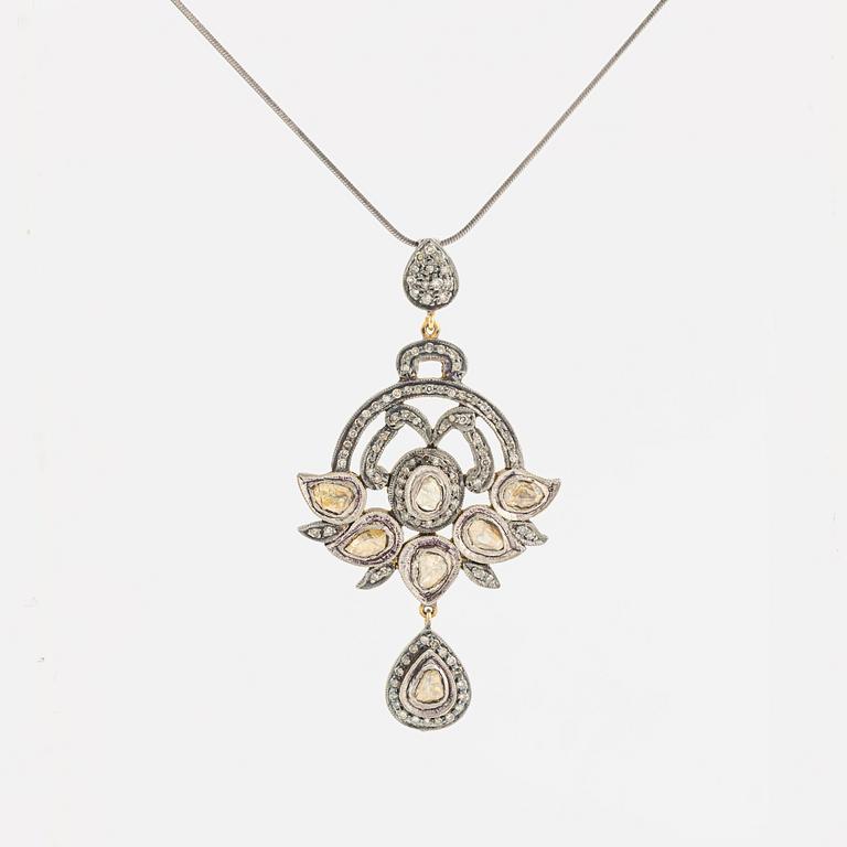 A faceted diamond necklace.