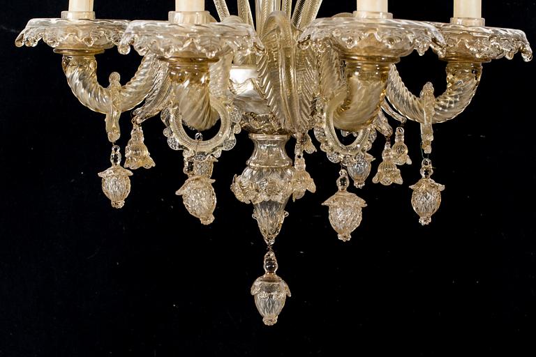 A 20th century six light Venetian style glass chandeliere.