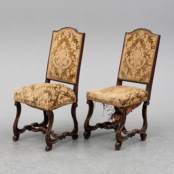 A pair of 18th century chairs.