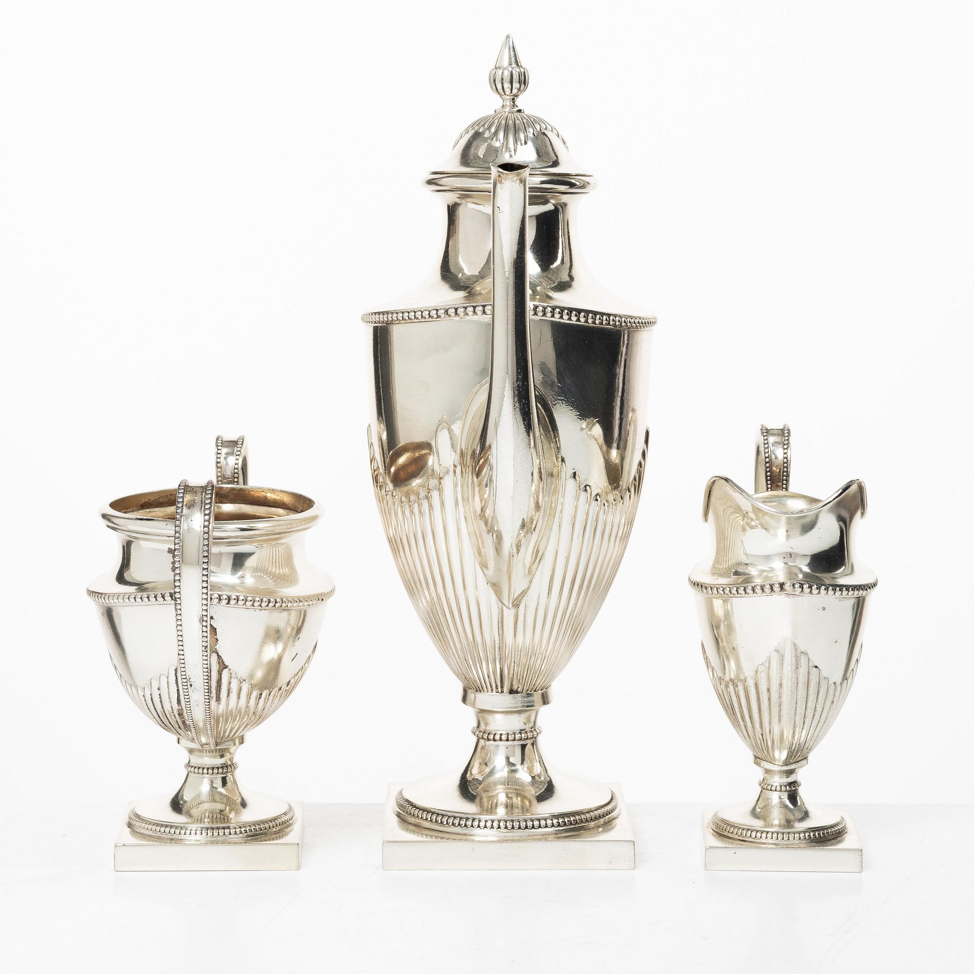 Guldsmedsaktiebolaget (GAB), A Swedish silver Gustavian style coffee pot, creamer and sugar bowl, Stockholm 1910.