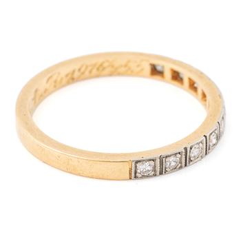 18K gold half-eternity ring with octagonal-cut diamonds.