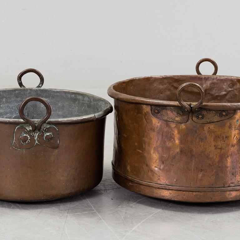 two copper pots from the 19th century.