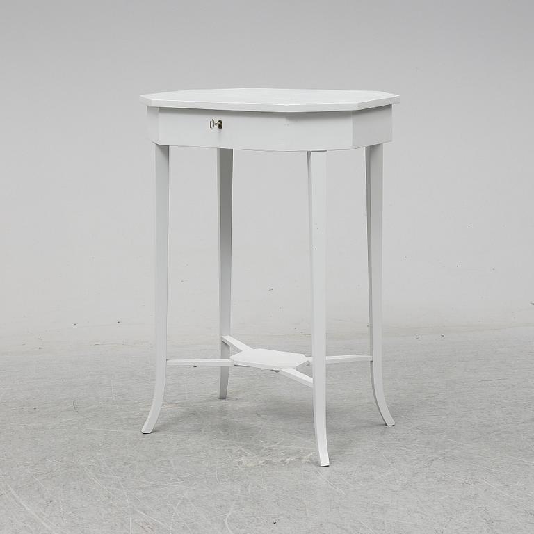 A ladys working table 20 th century.