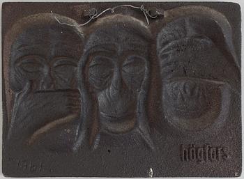 MICHAEL SCHILKIN, a cast iron plaque "See no evil, hear no evil, say no evil", signed and dated Högfors 1961.
