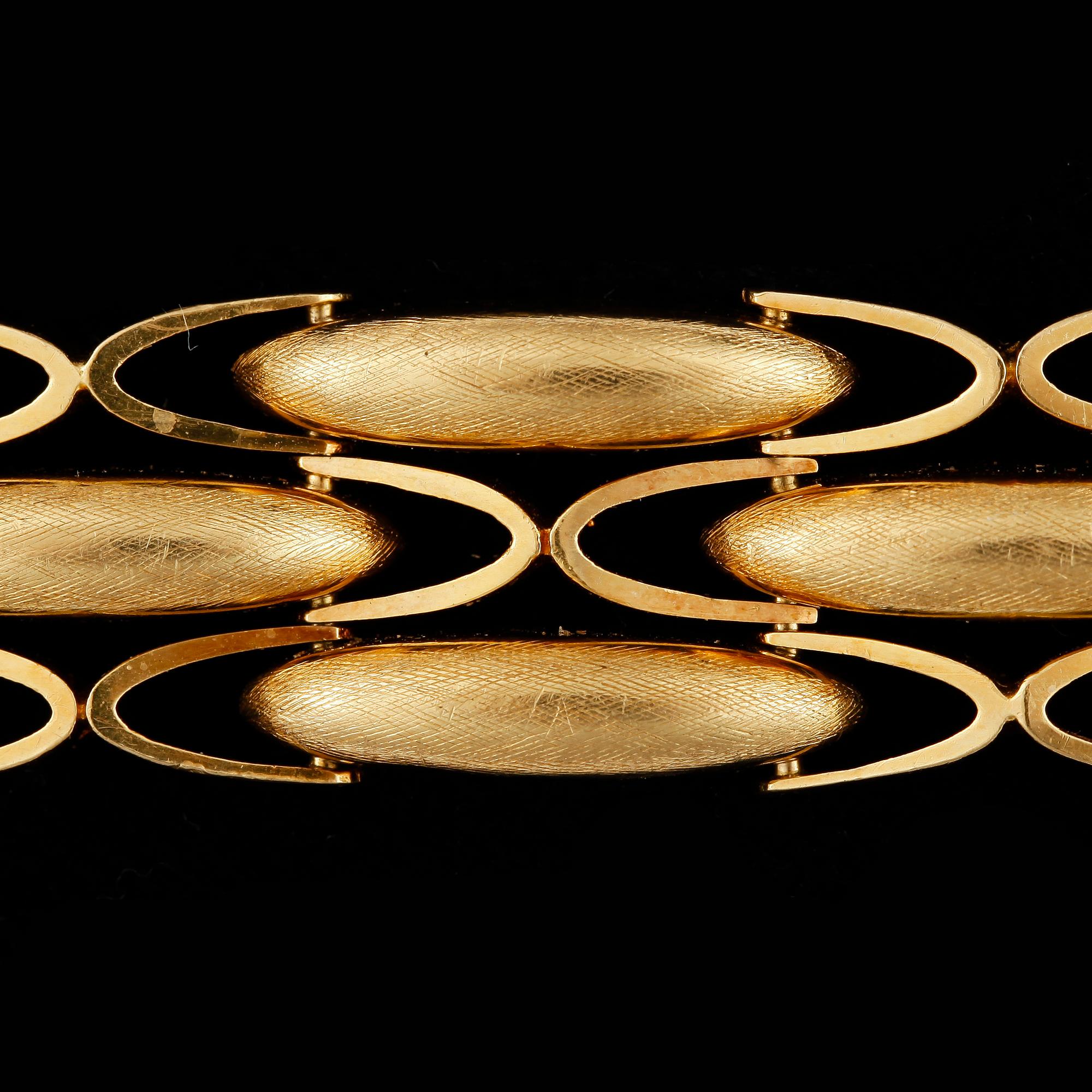 ARMBAND, 18k guld. Vikt ca 46g.