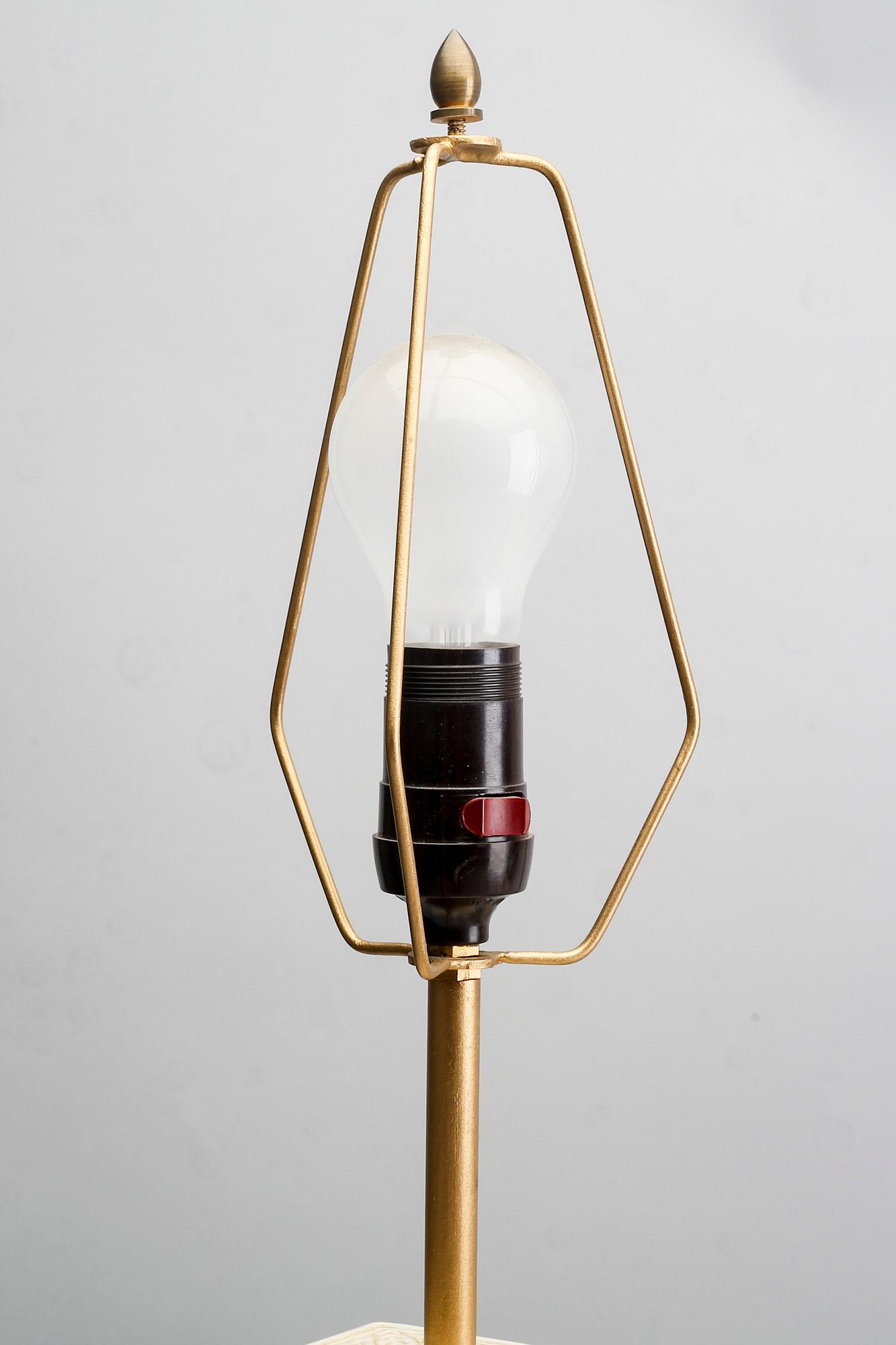 A pair of ceramic table lamps, second part of the 20th century.