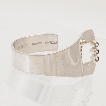 Per Dåvik a silver bracelet set with round brilliant-cut colorless synthetic spinels Alton Falköping 1973.