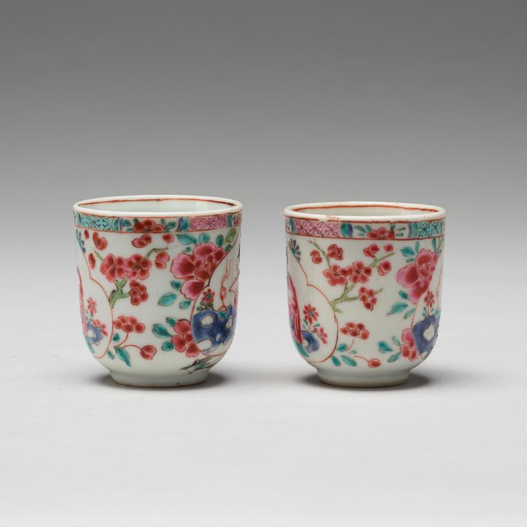 A pair of famille rose cups with dishes, Qing dynasty, Yongzheng (1723-35).