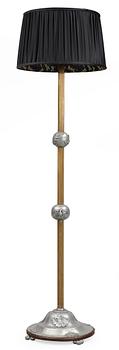 585. A brass and pewter floor lamp, 1920's-30's.