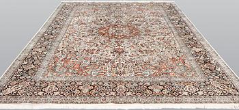 A silk Kashmir carpet, ca 330 x 246 cm.