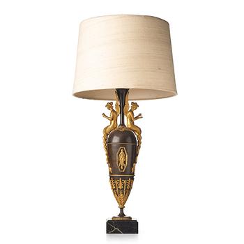 143. A French Empire early 19th century table lamp.