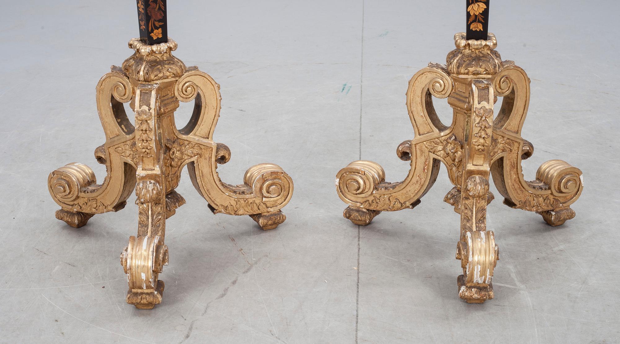 A pair of French Baroque circa 1700 candle stands.