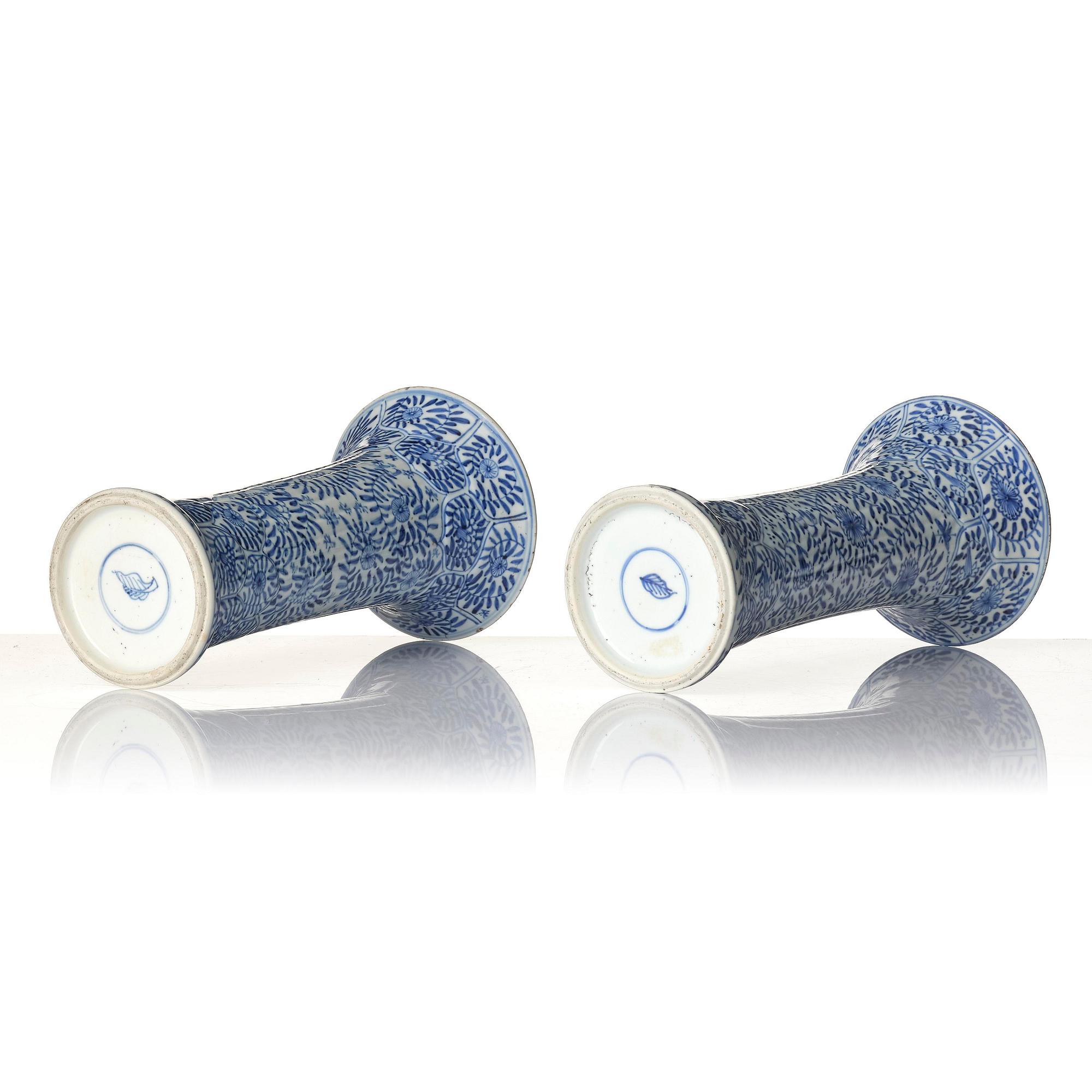 A pair of blue and white 'floral' vases, Qing dynasty, Kangxi (1662-1722).