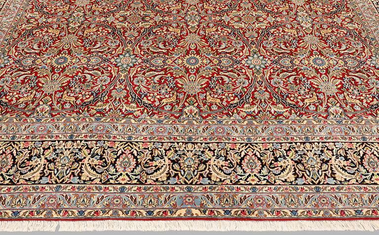A Kirman lavar carpet, 403 x 304 cm.