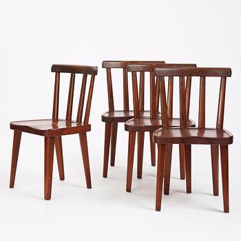 Axel Einar Hjorth, a set of four stained pine 'Utö' chairs, Nordiska Kompaniet Sweden 1930's.