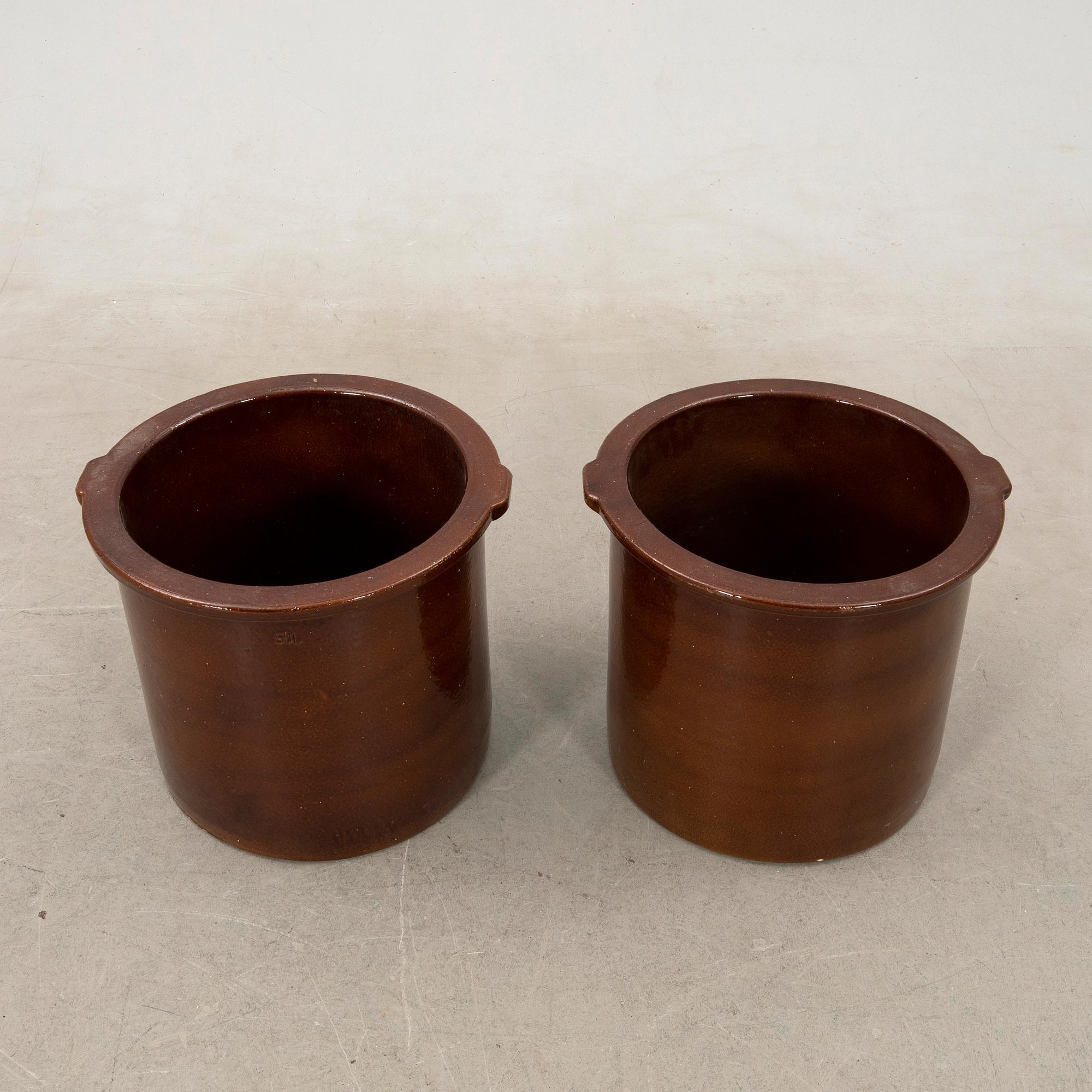 outer casing/vessel a pair of glazed ceramics.