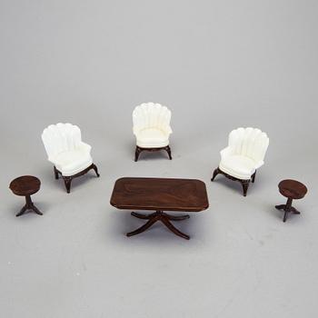 A lot of 26 pieces of plastic doll house furniture mostly by A Renwal products USA first half of the 20th century.