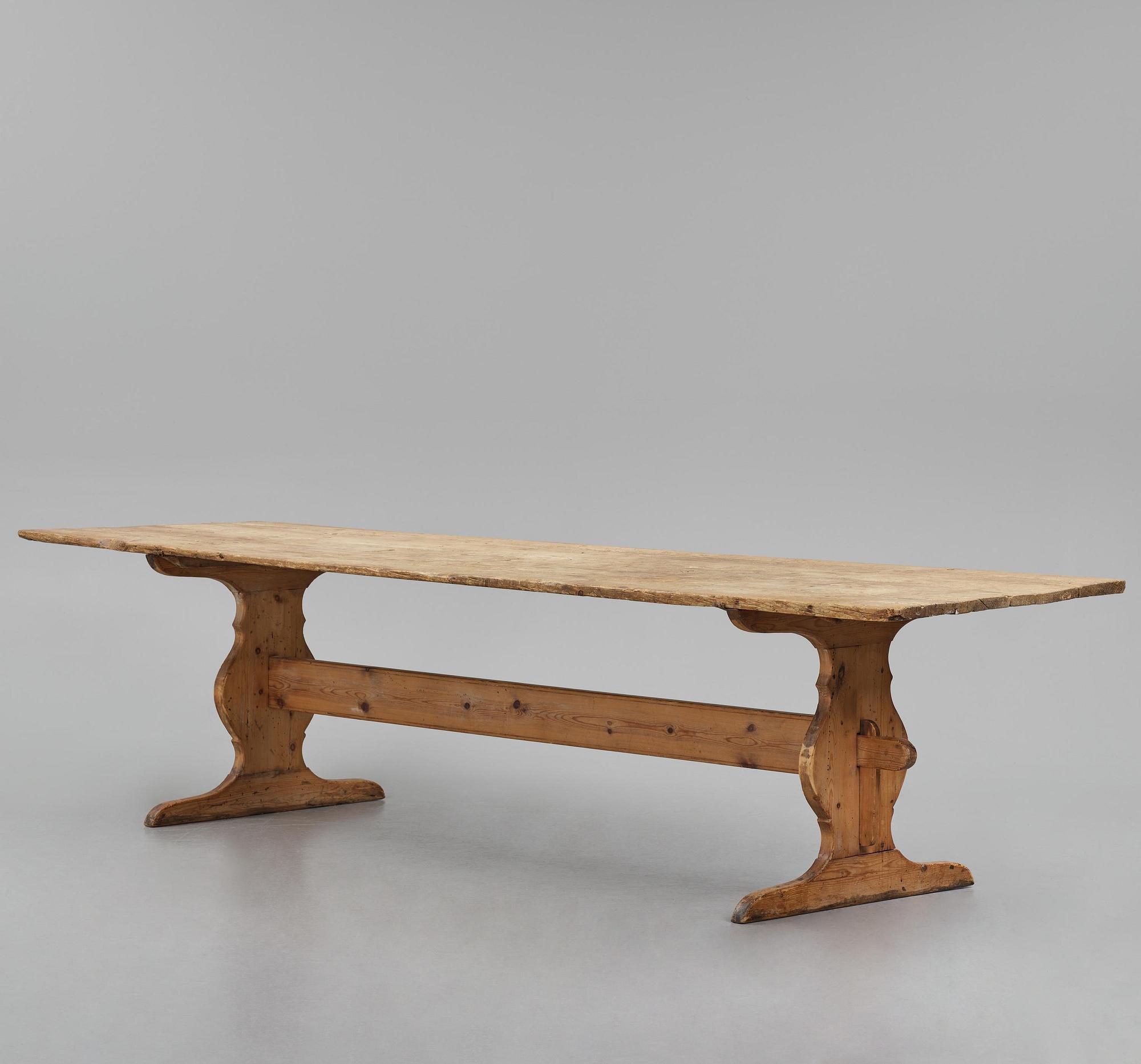 A pine trestle table, 20th century incorporating older elements.