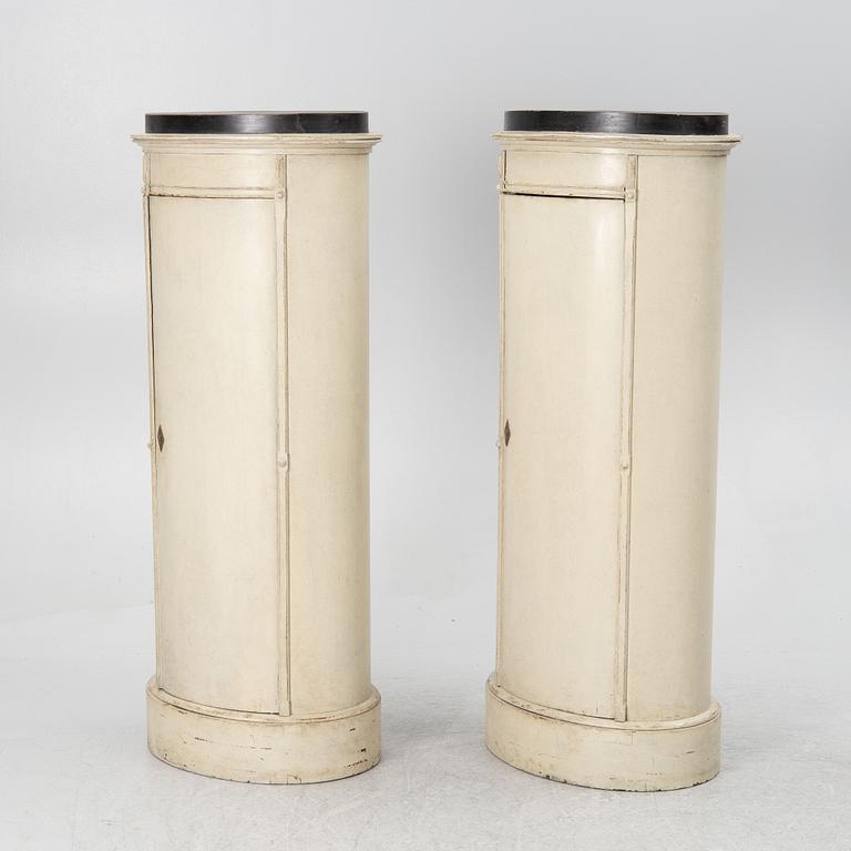 A pair of column cabinets, 19th century.