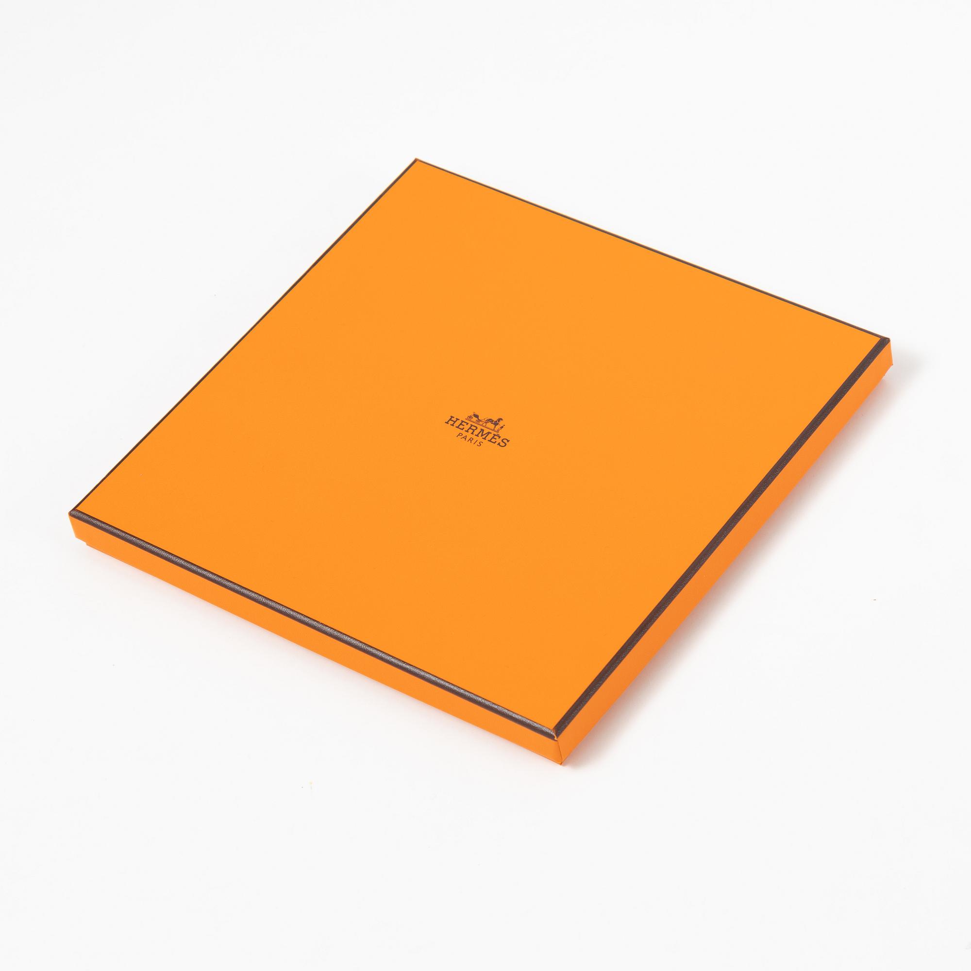 Hermès, a 'Persona' twill silk scarf.