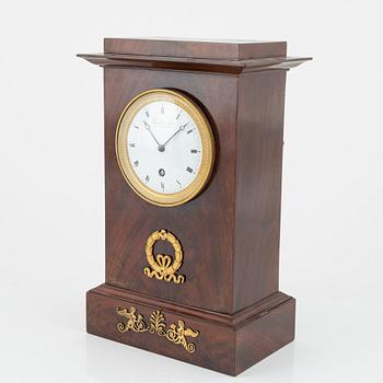 A French Empire mantel clock, signed 'Tarault à Paris', early 19th century.