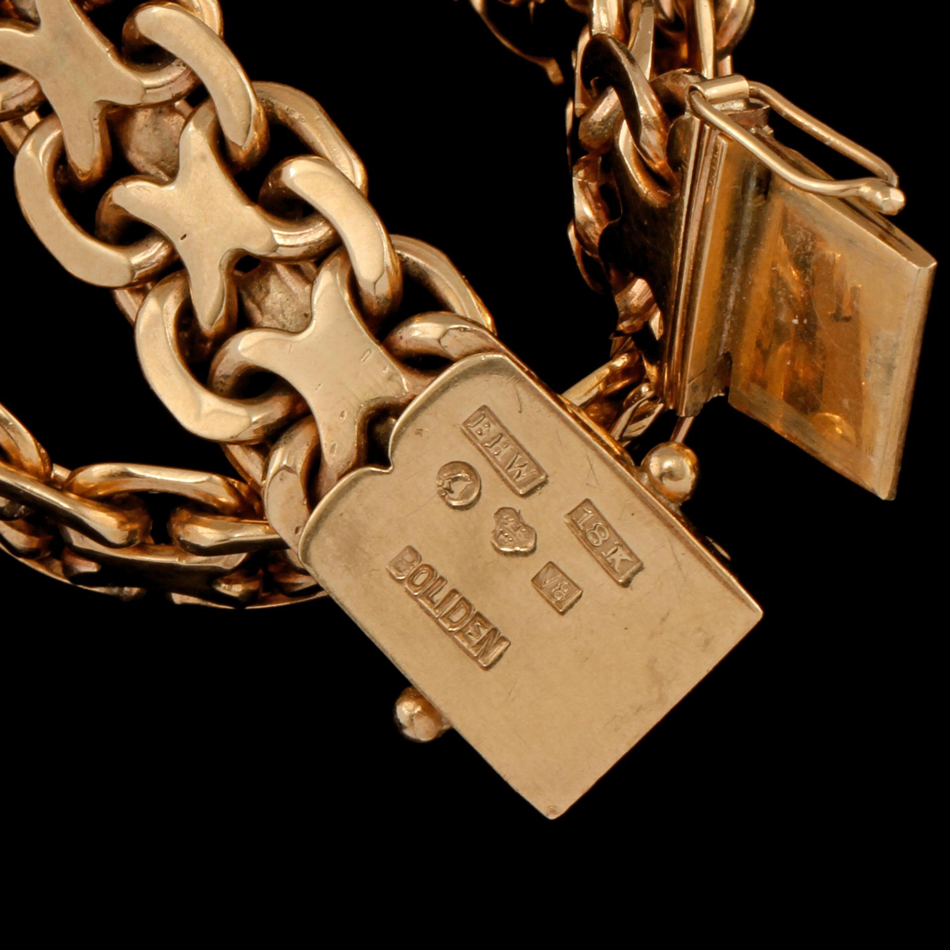ARMLÄNK, 18k guld, Erik Wahlbeck, Stockholm, 1947. Vikt 38 g.