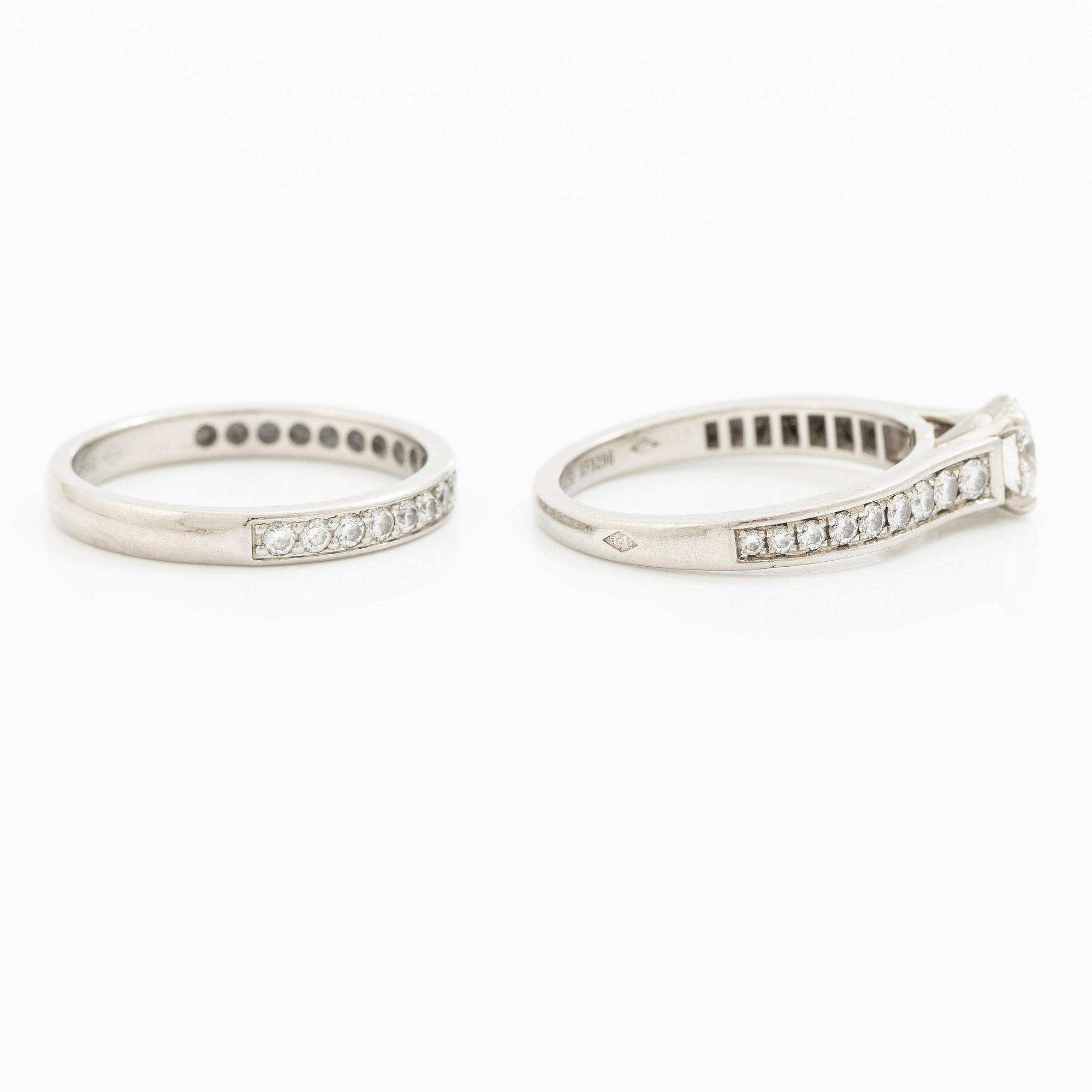 Cartier two rings platinum with round brilliant-cut diamonds.