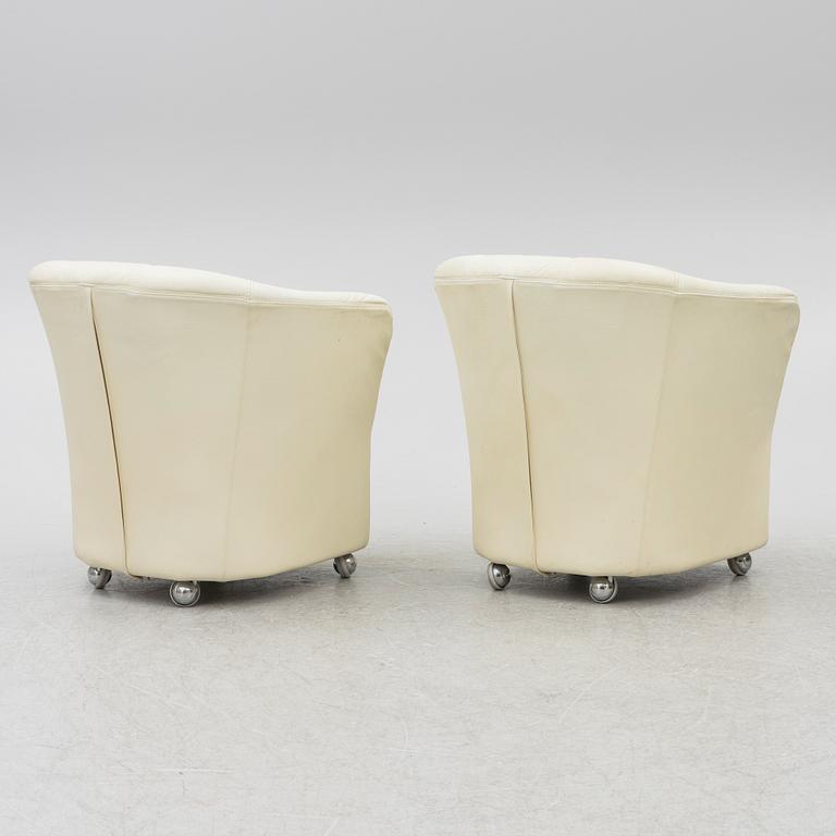 A pair of leather armchairs, Dux, Sweden, 1980's.