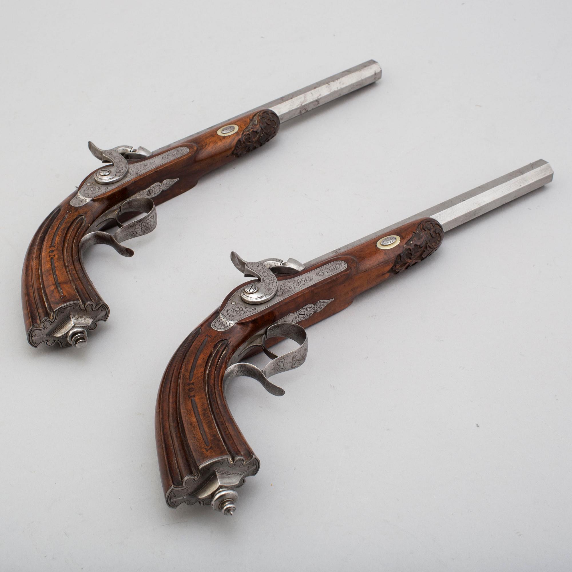 A mid 19th century pair of percussion pistols.