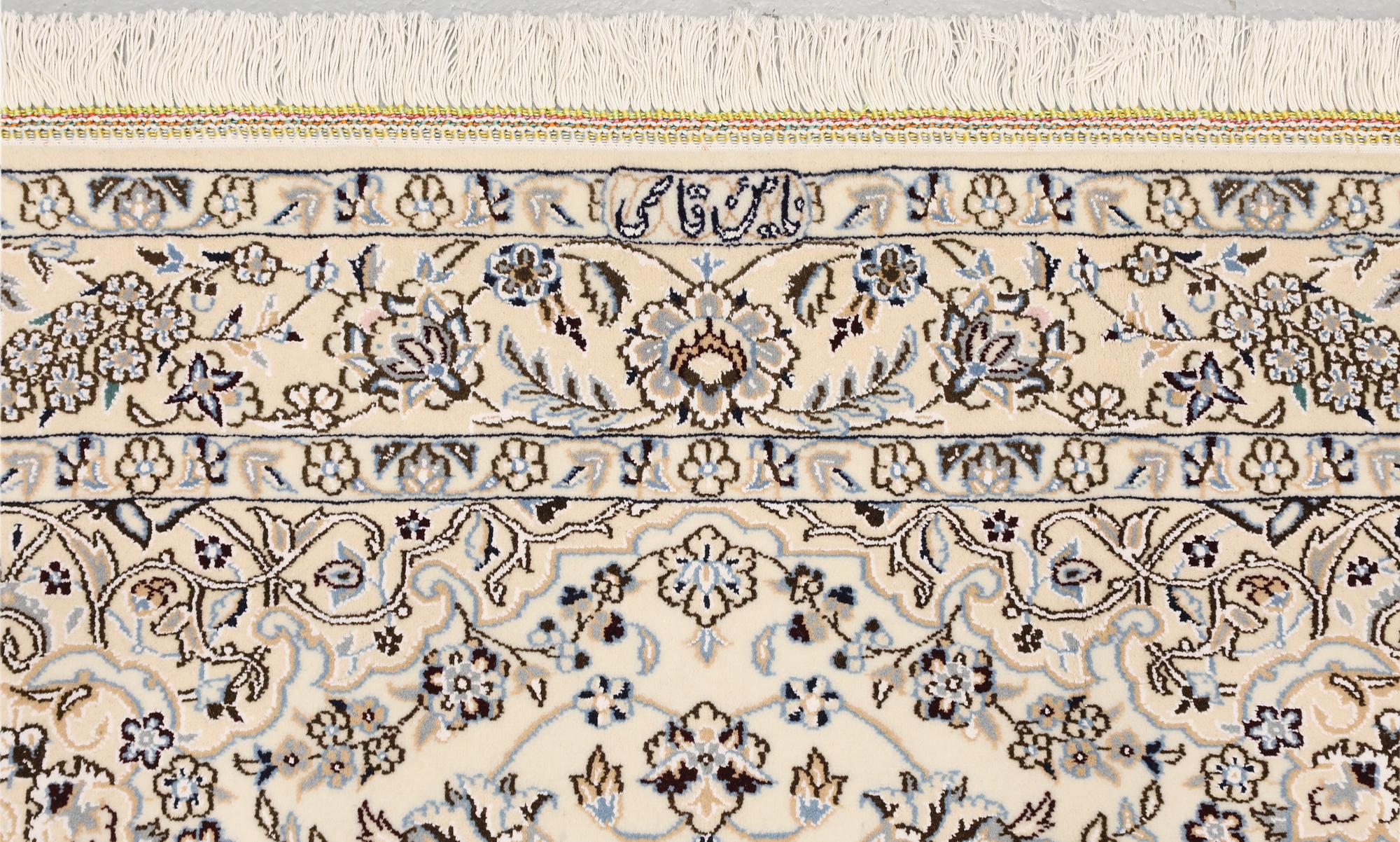 A Nain rug, part silk, so-called 9LAA, c. 210 x 130 cm.