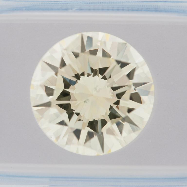 A loose 6.55 ct brilliant cut diamond. Quality N-O/VVS2, HRD certificate.