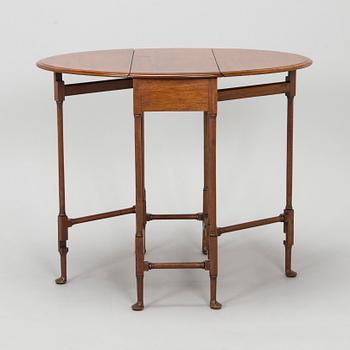 A 20th-century twin-gateleg table, England.