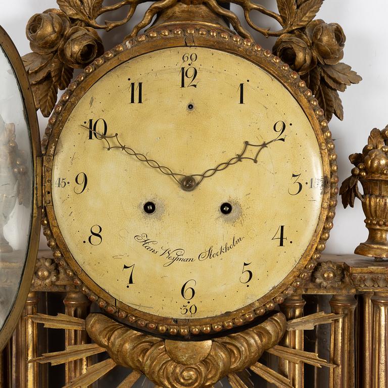 A Gustavian wall clock signed Hans Wessman, Stockholm, Sweden, late 18th century.