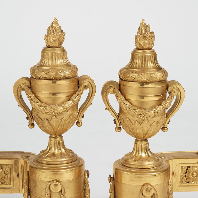 A pair of Louis XVI 18th Century bronze chenets.
