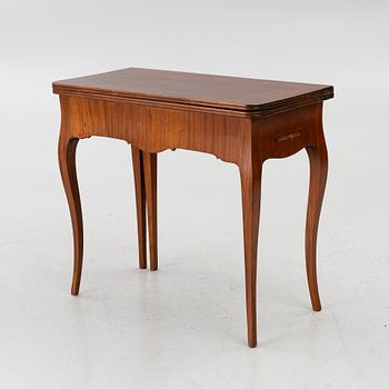A Rococo game table, 18th century.