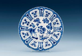 1499. A set of four blue and white dishes, Qing dynasty with Kangxi's six character mark and period. (4).
