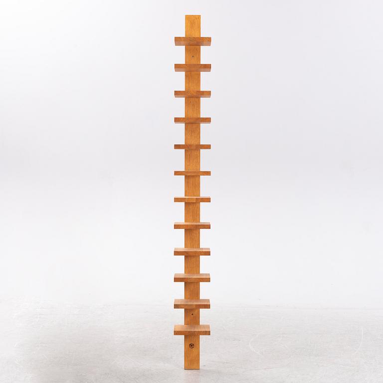 A 'Pilaster' shelf by John Kandell for Källemo, designed 1989.