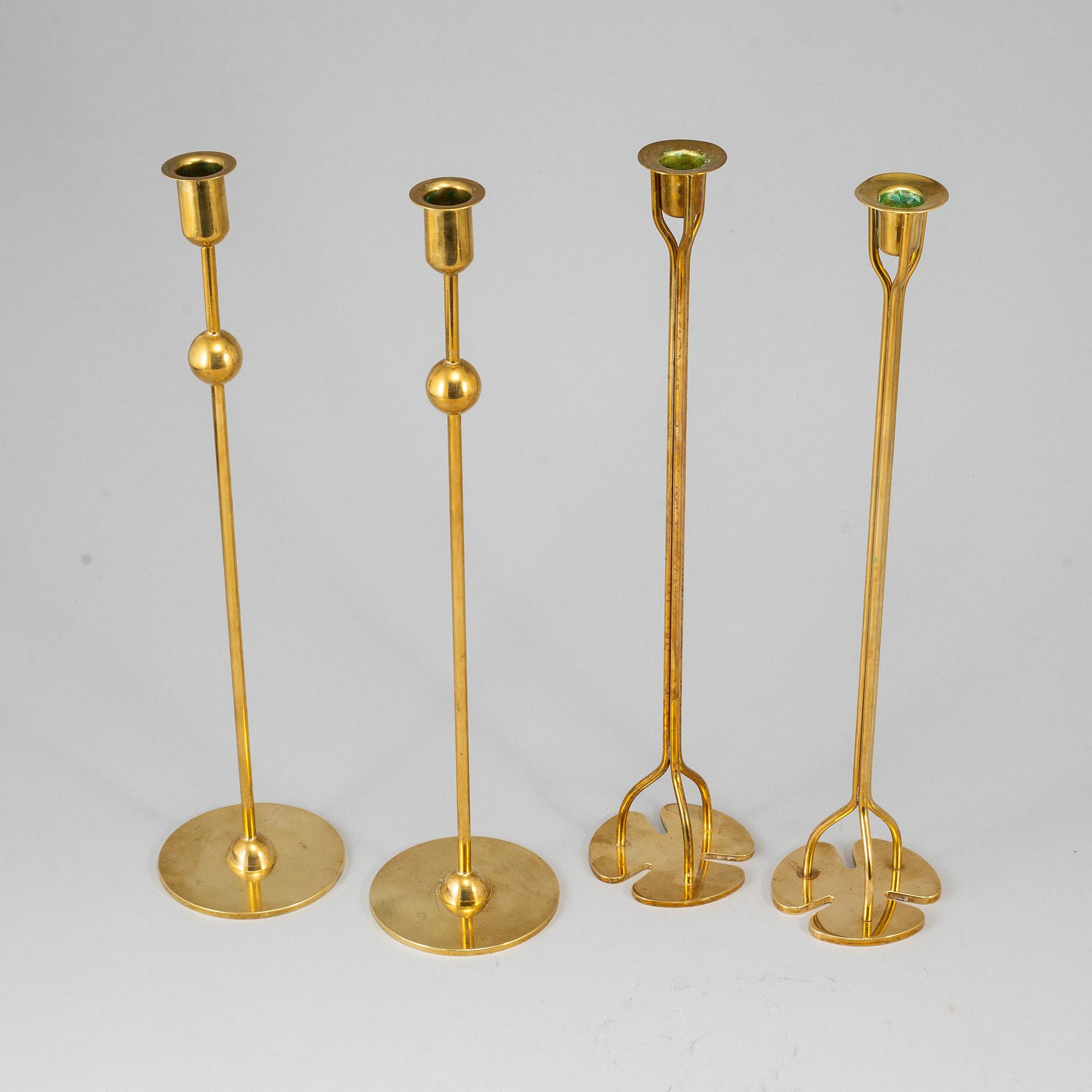 FIRMA SVENSKT TENN, 2+2 brass candlesticks. Designed by Estrid Ericson and Josef Frank.