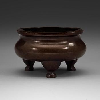 61. A bronze tripod censer, Ming dynasty (1368-1644).