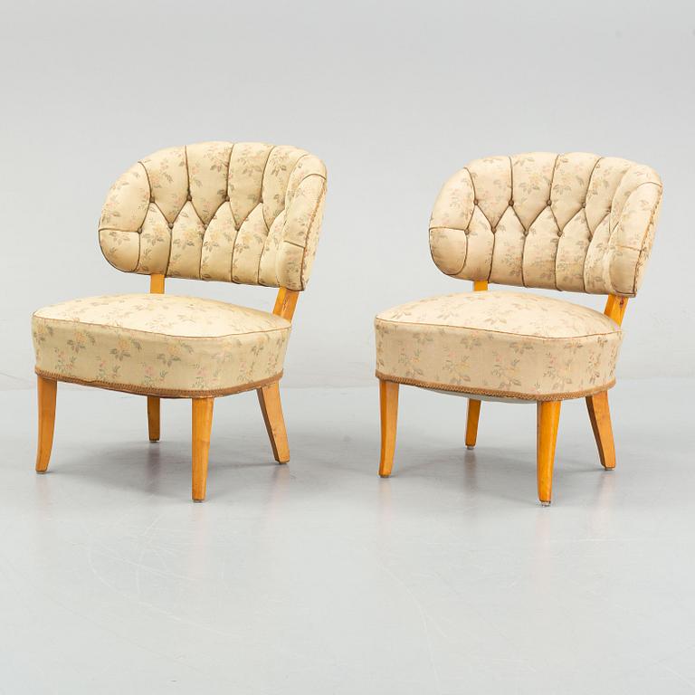 Carl Malmsten, a pair of 'Gamla Berlin' easy chairs, mid 20th Century.