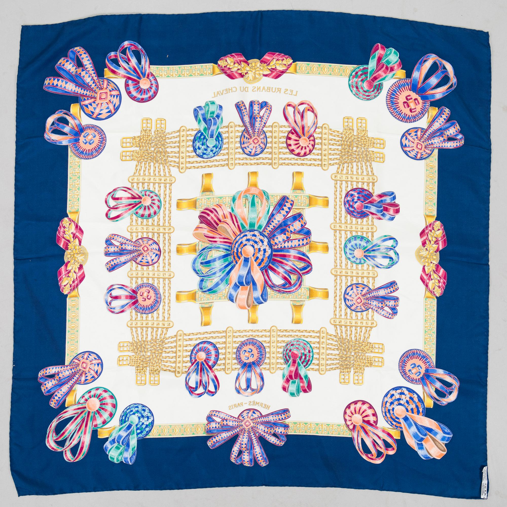 Hermès, a 'The Rubains of the Horse' scarf.