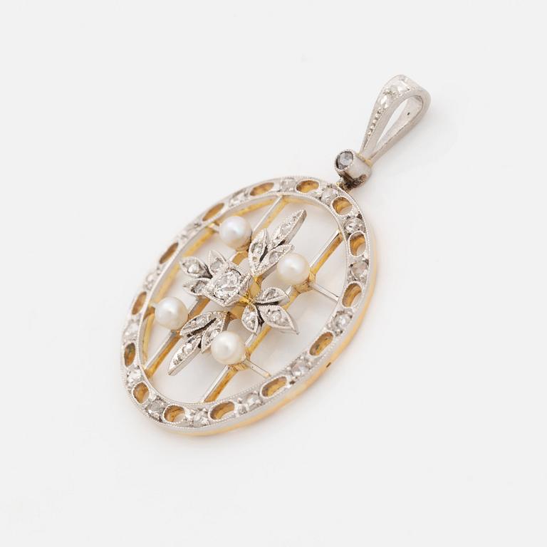 A platinum and gold pendant set with old- and rose-cut diamonds and pearls.