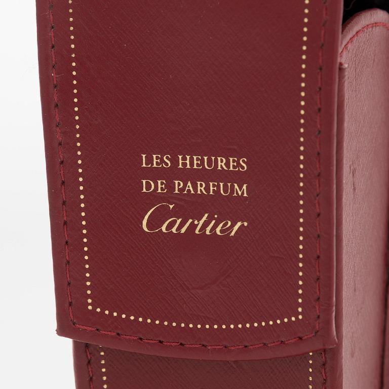Cartier, parfymfodral med parfymflaska och sminkspegel.