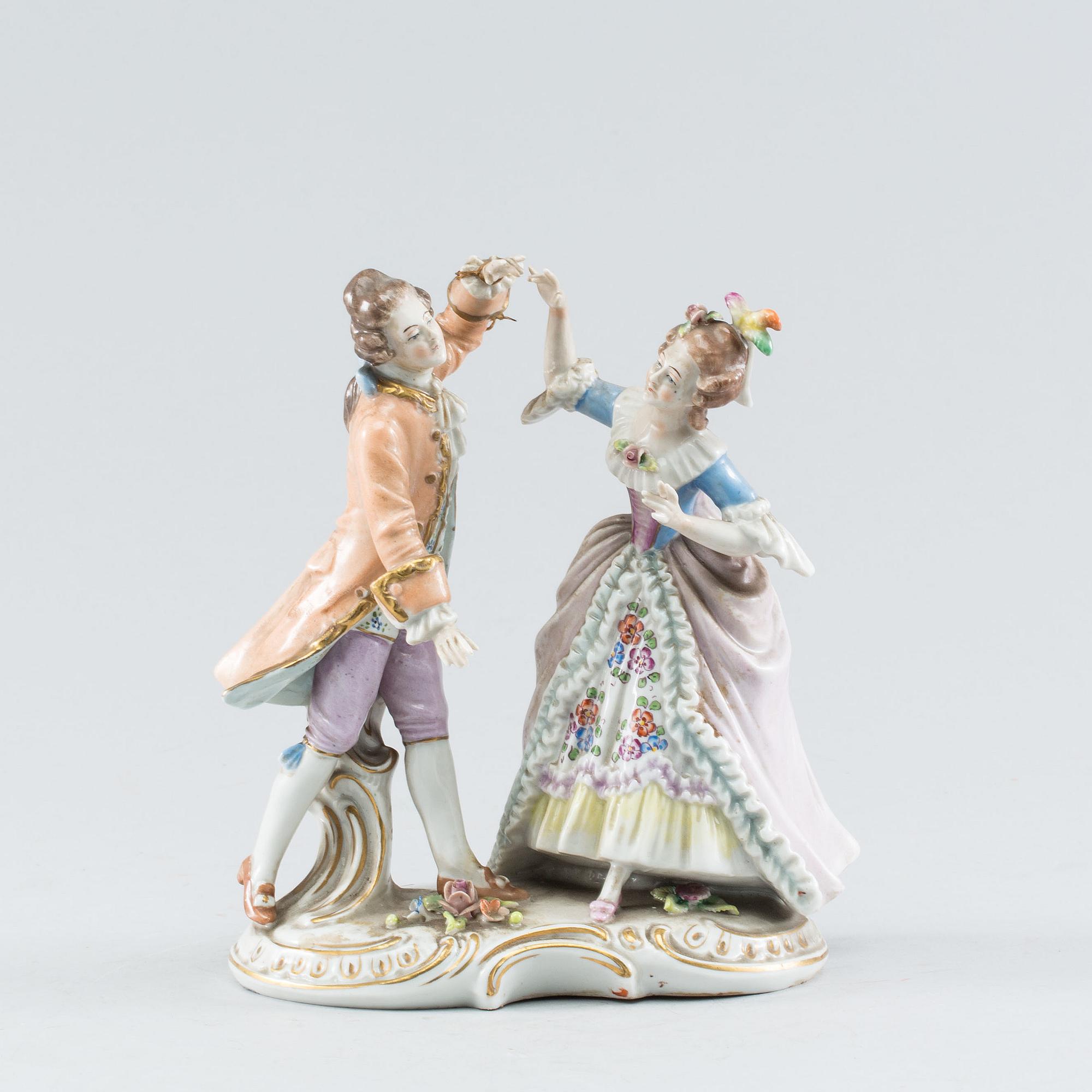 A Rococo style porcelain figure group. First half of the 20th Century.