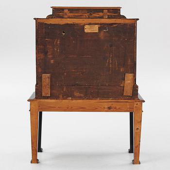 A South-German Baroque ebonized collector's cabinet on stand, circa 1700.