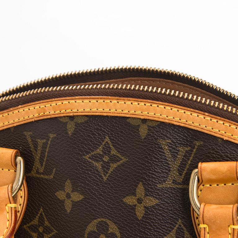 Louis Vuitton, a 'Lockit PM' bag.